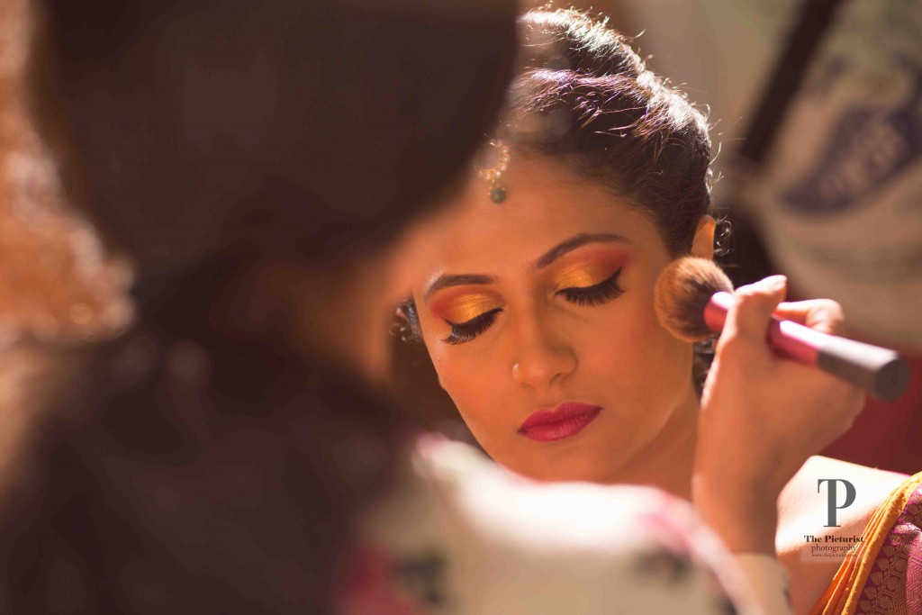 finishing touches to bridal makeup in bangalore