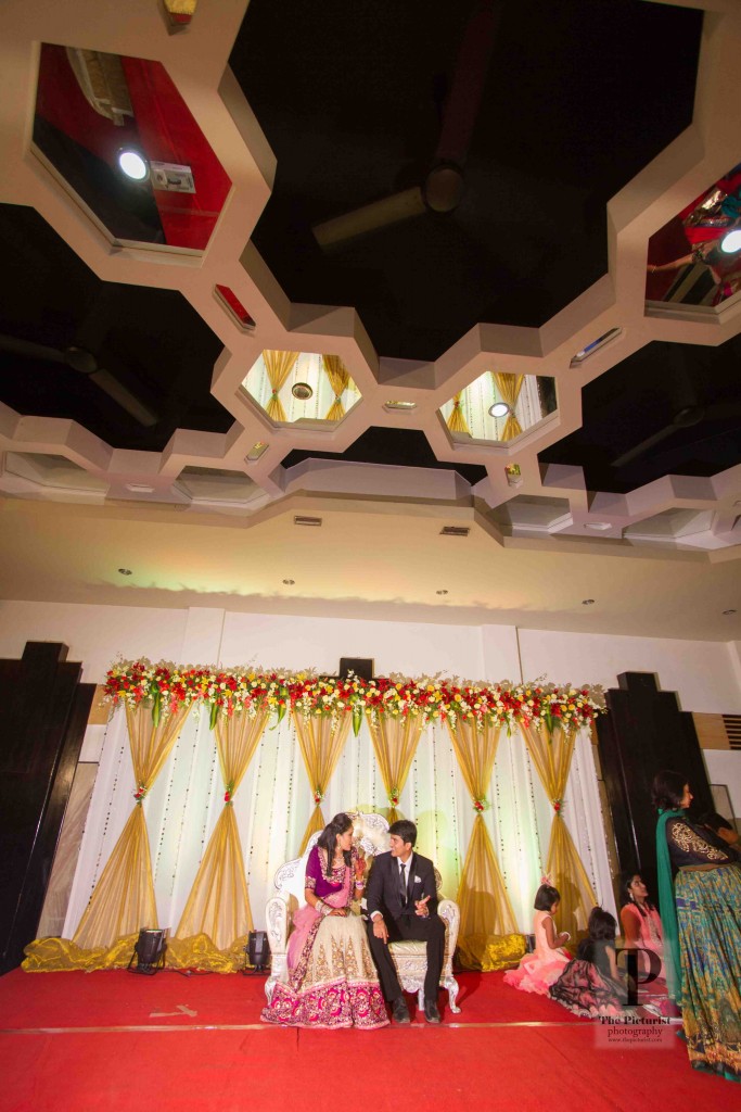 bride and groom at their ring ceremony at The Club bangalore